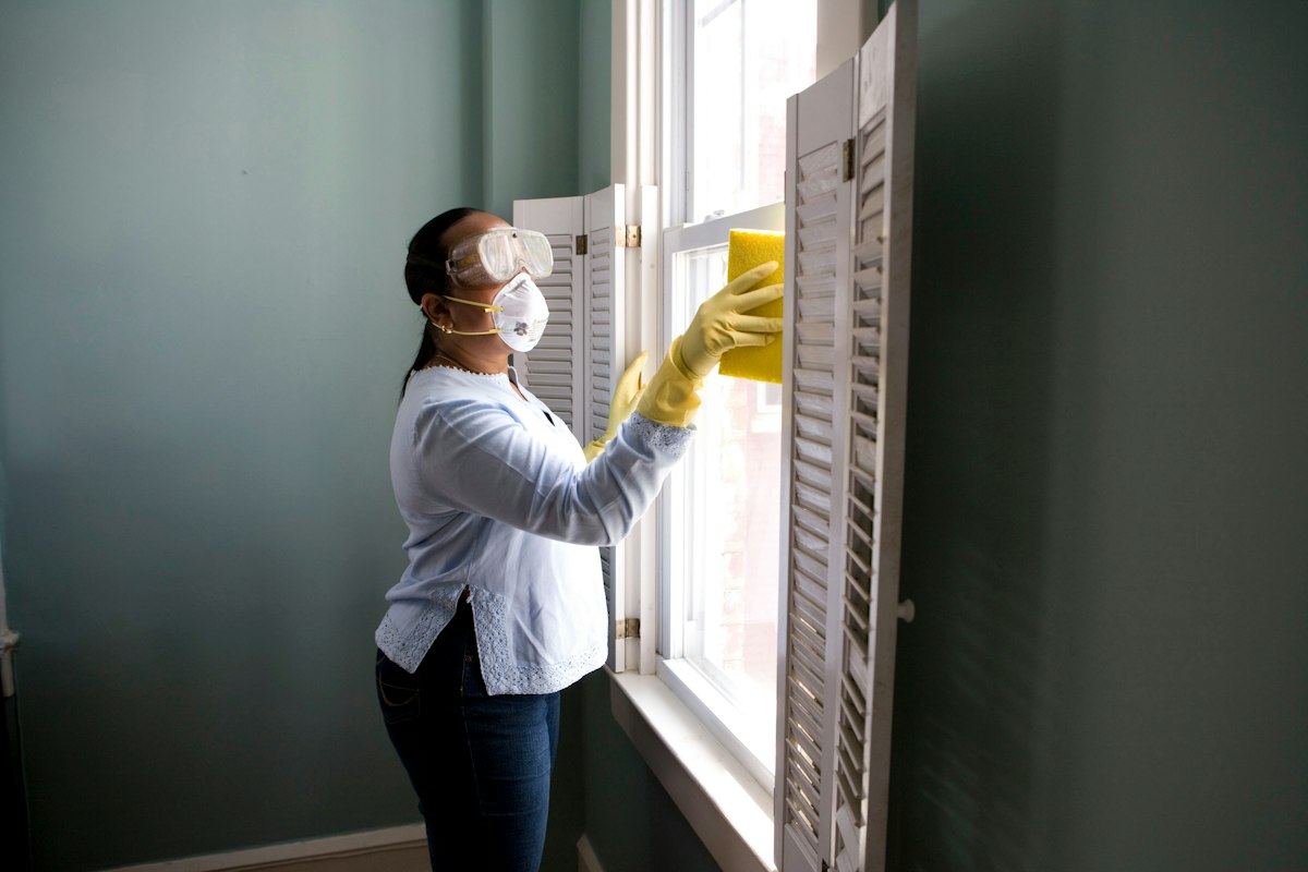 Residential cleaning professional shown inside a fictional website concept